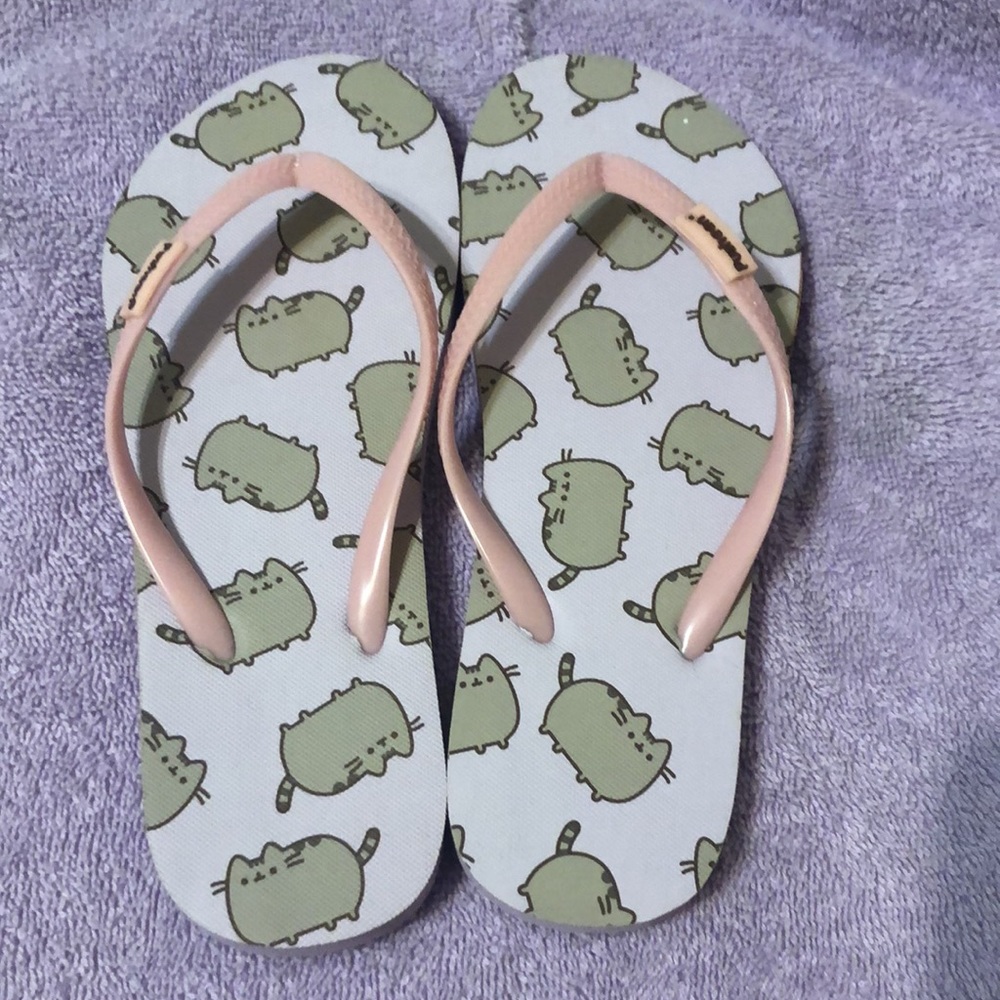 Like New Pusheen flip flops. Size 7/7.5